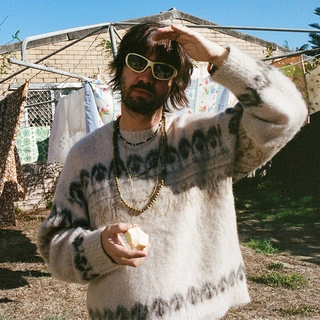 Обложка артиста Tame Impala